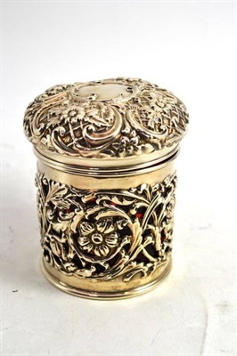 Lot 580 - A Silver and Ruby Glass Jar, Birmingham 1903, with a pierced and repousse decoration