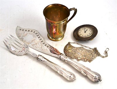 Lot 586 - A Silver Christening Mug, Birmingham 1909; A Plated Fish Server and Fork; A Strut Clock; and A...