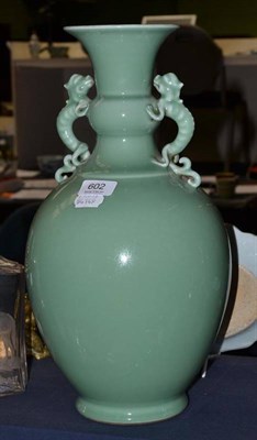 Lot 602 - A Chinese 19th century Celadon vase, height 41cm with dragon form handles  Ex. Renishaw Hall