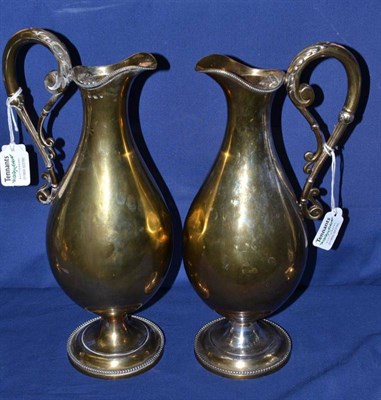 Lot 611 - A Pair of Victorian Silver Gilt Claret Jugs, Elkington & Co, Birmingham 1868, the beaded...