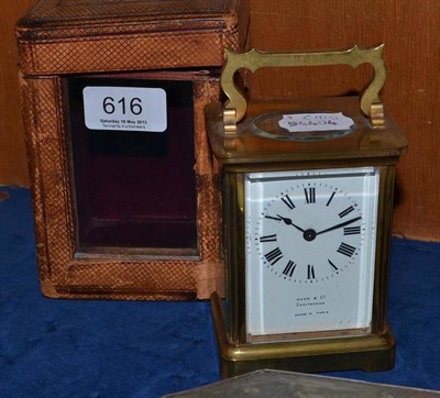 Lot 616 - A Brass Carriage Timepiece, circa 1900, case with carrying handle, enamel dial signed by...