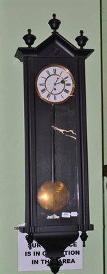 Lot 655 - An Ebonised Vienna Type Wall Timepiece, circa 1890, architectural top with turned finials,...