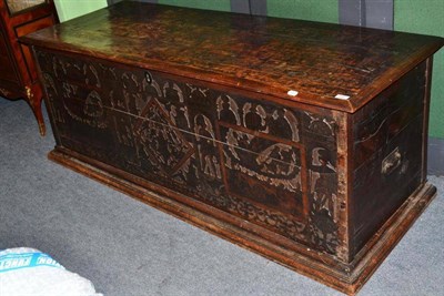 Lot 656 - An Italian Cypresswood Cassone, with pen decorated hinged lid depicting figures, with chip...