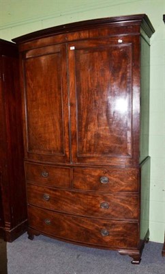 Lot 664 - A Late George III Mahogany Bowfront Linen Press, 132cm wide