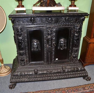 Lot 668 - A 17th Century Style Italian Ebonised Cupboard, 124cm wide   Ex. Renishaw Hall