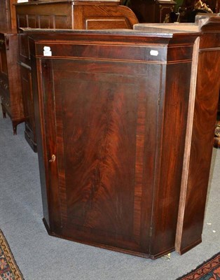 Lot 671 - A George III Mahogany Straight Front Hanging Corner Cupboard, height 112cm