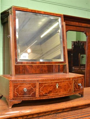 Lot 682 - A George III Mahogany and Boxwood Strung Bowfront Dressing Table Mirror, fitted with three...