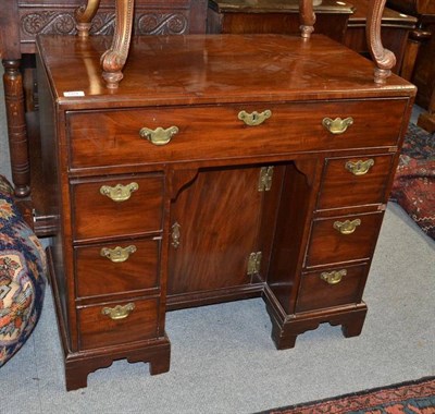 Lot 684 - An 18th Century Mahogany Kneehole desk, 83cm wide