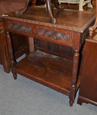 Lot 686 - A Late Victorian Carved Oak Side Table, fitted with two drawers, 91cm wide