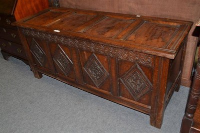 Lot 688 - A Late 17th Century Joined Oak Coffer, the front with four carved lozenge shaped motifs, 149cm wide