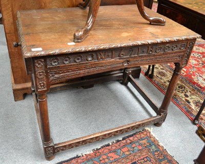 Lot 697 - A Small Carved Oak Side Table, with two frieze drawers and carved 1671 and initialled 'W.B',...