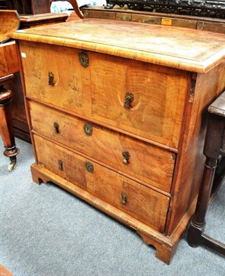 Lot 699 - An 18th Century Walnut Provincial Three Drawer Chest, raised on bracket feet, with converted...