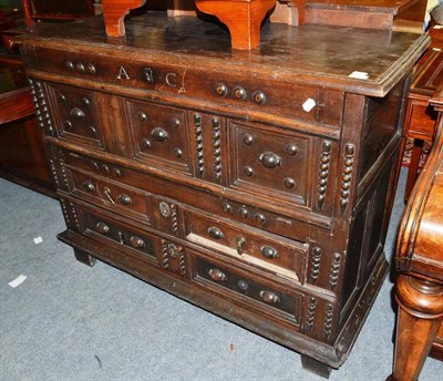 Lot 701 - A 17th Century Joined Oak Chest of Drawers, with fall front, 120cm wide    Ex. Renishaw Hall