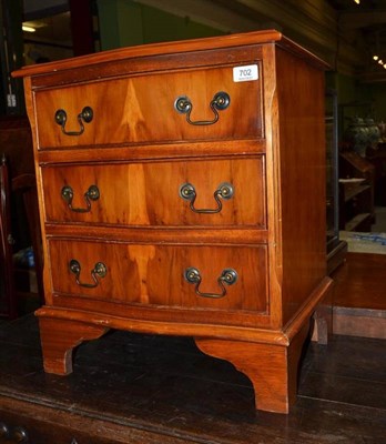 Lot 702 - A Small Three Drawer Yewwood Veneered Chest of Drawers, 50cm wide