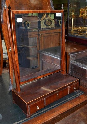 Lot 704 - A George III Mahogany Toilet Mirror, with rectangular plate, fitted with three drawers, 44cm wide