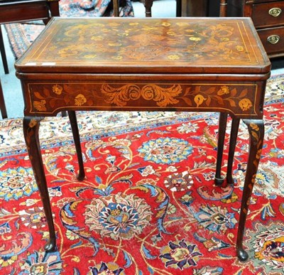 Lot 714 - A Dutch Floral Marquetry Card Table, fitted with two frieze drawers and raised on cabriole legs and