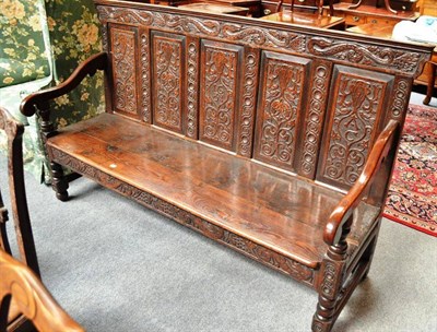 Lot 729 - A 19th Century Carved Oak Settle, 177cm wide   Ex. Renishaw Hall