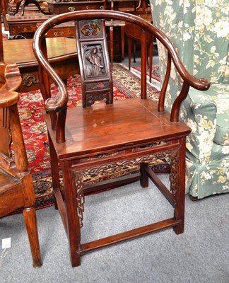 Lot 731 - A Chinese Open Armchair, with decorative carved splat and scrolling hand grips, 56cm wide