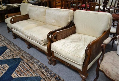 Lot 748 - An Early 20th Century Double Cane Three Piece Bergere Suite, on claw and ball feet, settee...