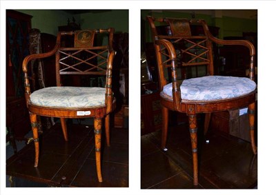 Lot 773 - A Pair of Painted Satinwood Occasional Chairs, with cane seats and loose cushions, simulated bamboo