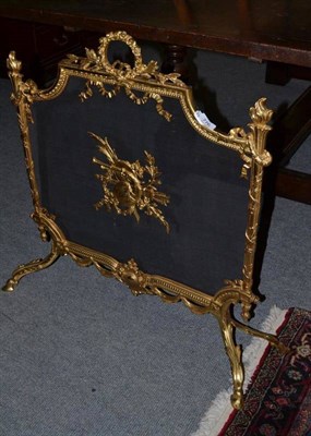 Lot 776 - A Gilt Brass Fire Screen, with acanthus and hoof feet, 76cm wide