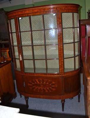 Lot 783 - An Edwardian Mahogany, Satinwood, Boxwood and Ebony Strung Display Cabinet, circa 1900, of bowfront