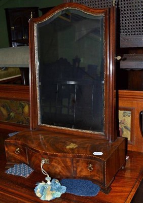 Lot 784 - A George III Mahogany Serpentine Shaped Dressing Table Mirror, with barber's pole stringing, fitted