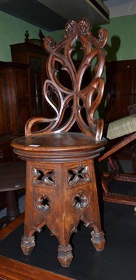 Lot 787 - A Reformed Gothic Oak Back Stool, stamped 'Trueman Manufacturers Doncaster', 41cm wide