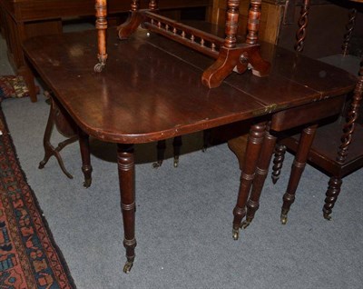 Lot 799 - A Regency mahogany concertina action extending dining table, 96cm extended, lacking additional...