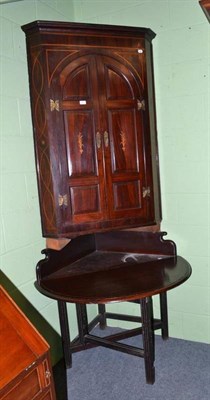 Lot 820 - A George III Mahogany Hanging Corner Cupboard, overall height 235cm with panelled cupboard...