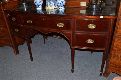 Lot 832 - A George III Style Mahogany Bowfront Sideboard, with square tapering legs, oval brass plate...