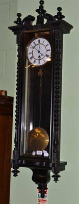 Lot 839 - An Ebonised Wall Timepiece, circa 1890, with turned finials, bobbin shaped columns, 6-1/2-inch...