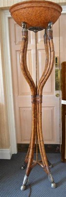 Lot 866 - A Large Bamboo Uplighter, in Georgian style with silvered horse head supports and hoof feet, height