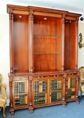 Lot 868 - A Reproduction Mahogany Breakfront Bookcase, with faux book fronts, 184cm wide