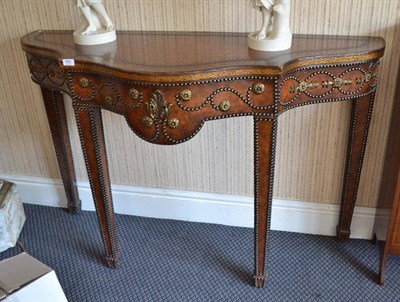 Lot 880 - A Studded Leather Serpentine Console Table, of recent date, 138cm wide