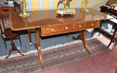 Lot 883 - A Late George III Mahogany and Rosewood Crossbanded Sofa Table, with two frieze drawers, 152cm...