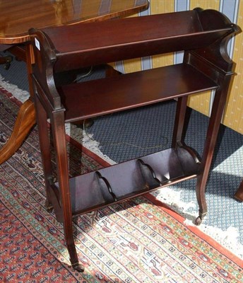 Lot 884 - An Edwardian Inlaid Mahogany Book Stand, with brass toes and castors, bears label C.S.L Army & Navy