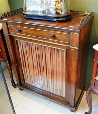 Lot 892 - A Regency Rosewood and Brass Inlaid Cabinet, with three-quarter brass gallery above a single drawer