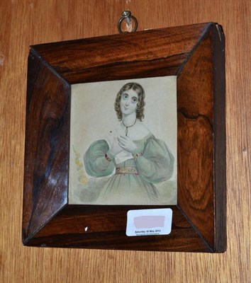 Lot 1055 - English School (19th century)  Watercolour of a Lady  10cm by 10cm, in a rosewood frame