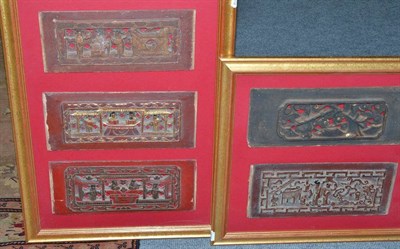 Lot 1074 - A Pair of Gilt Frames Set with Chinese Carved Wood Panels, each panel approximately 33cm by 14cm