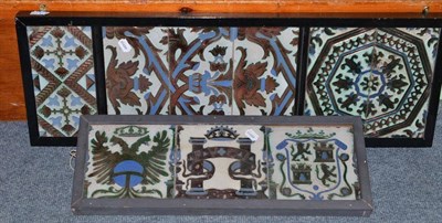 Lot 1075 - A Collection of Nine Spanish Cuerda Sec Tiles, in 16th century style, framed in two panels