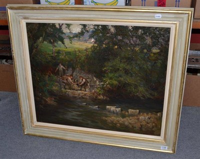 Lot 1139 - George Orkney Work (c.1870 - 1921) Sheep washing in a river, a sunlit meadow beyond...