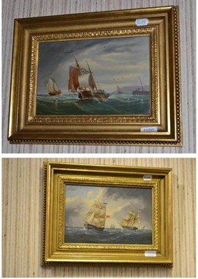 Lot 1150 - William Daniel Penny (1834 -1924)  Fishing boats in an open sea, Shipping off a harbour Signed...