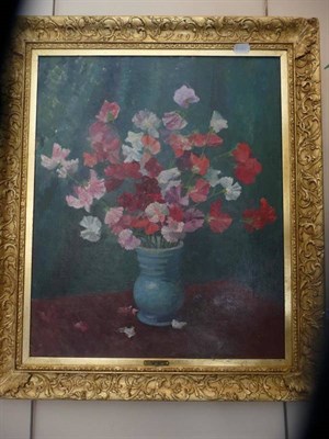 Lot 1160 - Arthur Bateman R.A. (1889 -1970)  A still life of sweet peas in a blue vase  Signed, oil on canvas