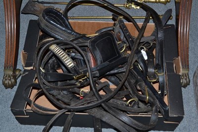 Lot 1208 - A Leather Driving Harness, Bridle Roller and a Breaching Strap with brass fittings