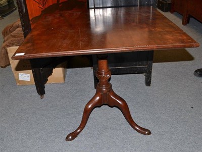 Lot 1210 - A George III Mahogany Tripod Table, on turned base and pad feet, 80cm wide