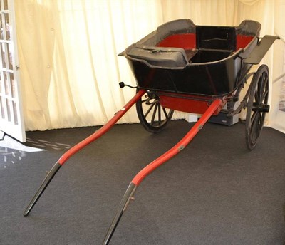 Lot 1214 - A Red and Black Painted Horse Trap, possibly Irish, the wheels bearing stamp Breen & Sons,...