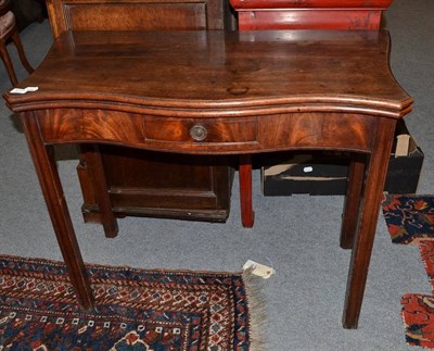 Lot 1217 - George III Mahogany Fold-Over Tea Table of serpentine shaped form, 88cm wide