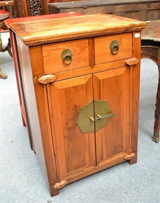 Lot 1241 - A Chinese Hardwood Two-Door Cabinet, 20th century, with two drawers and cupboard doors below,...