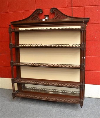 Lot 1245 - A Set of Mahogany Hanging Shelves, in George III style, 117cm wide, bears paper label Edward &...